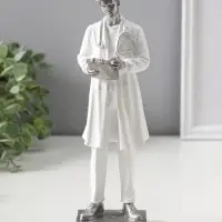 Сувенир полистоун "Мужчина-доктор в белом халате с медицинской картой" 25,5 см