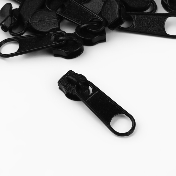 Набор: рулонная молния «Спираль» №3, 10 м, 20 бегунков, 40 верхних ограничителей, 20 нижних ограничителей, цвет чёрный Набор: рулонная молния «Спираль» №3, 10 м, 20 бегунков, 40 верхних ограничителей, 20 нижних ограничителей, цвет чёрный