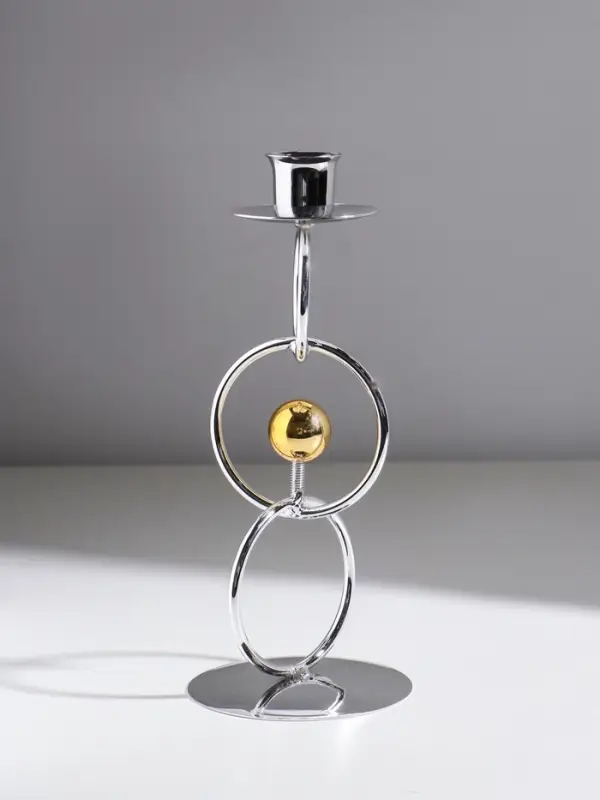 Подсвечник металл на 1 свечу  Подсвечник металл на 1 свечу "Кольца и шарики" серебро с золотом d=2,5 см 9х9х22 см