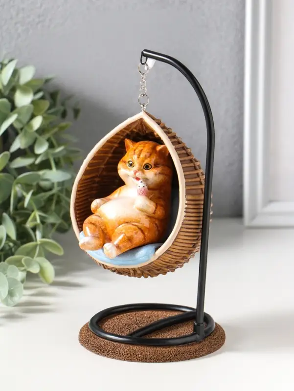 Сувенир полистоун лак "Пухлый кот ест мороженое, в кресле-качеле" 11,5х10,5х18 см