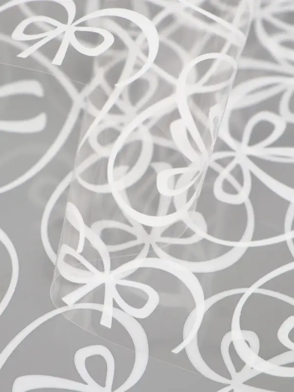 Плёнка для цветов &laquo;Бантики&raquo;, прозрачная/белая, 0.6&times;9.3&plusmn;5% м, 40 мкм, 200 г