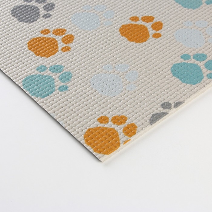Коврик под миску «Лапки светлые», 52х38х0,3см Коврик под миску «Лапки светлые», 52х38х0,3см