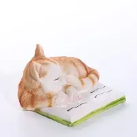 Сувенир полистоун "Спящий котёнок на книге" рыжий 9,5х9х5,7 см