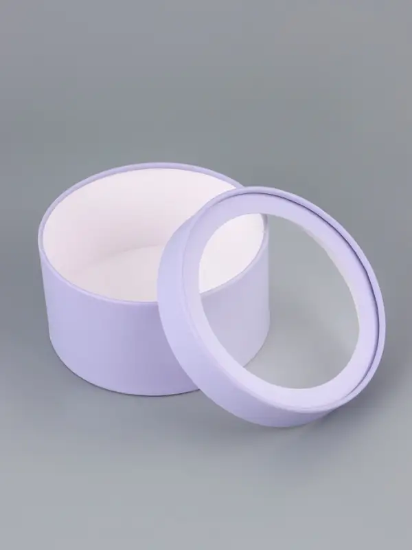 Подарочная коробка круглая бледно-фиолетовая, завальцованная с окном, 18&times;10 см