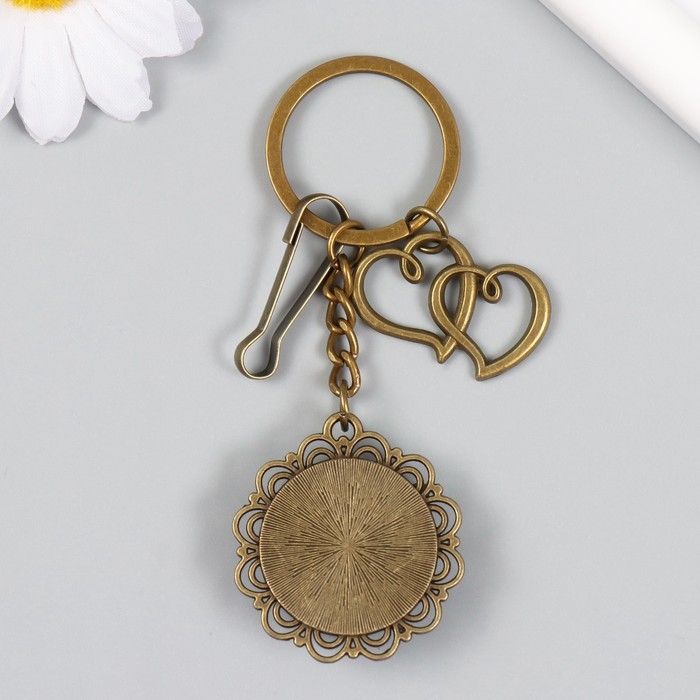 Брелок металл, стекло с карабином "Двойное сердце и цветок в медальоне" бронза 9,5 см
