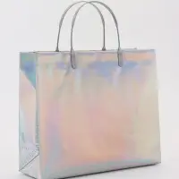 Пакет подарочный ПВХ, голография, серебро, пластиковая ручка, 26×22.5×10 см Пакет подарочный ПВХ, голография, серебро, пластиковая ручка, 26×22.5×10 см