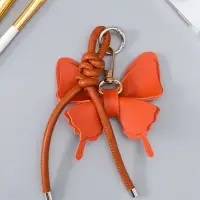 Брелок на карабине "Бабочка с узлом" красно-бордовый 13,5х9,5х2,5 см