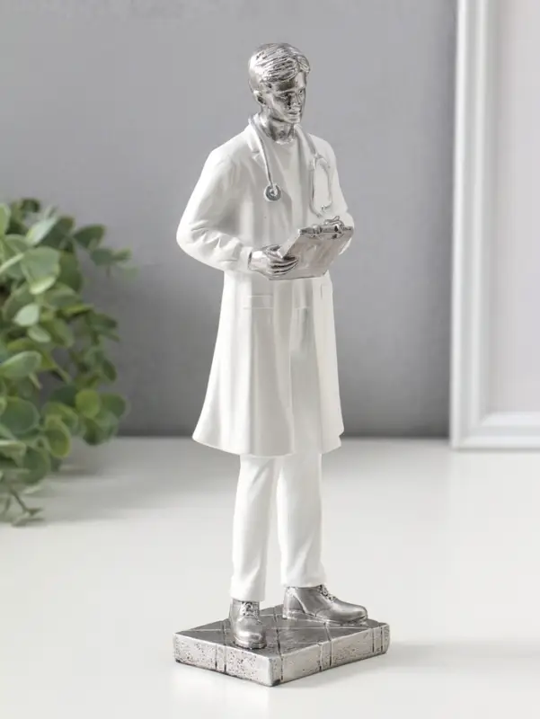 Сувенир полистоун "Мужчина-доктор в белом халате с медицинской картой" 25,5 см