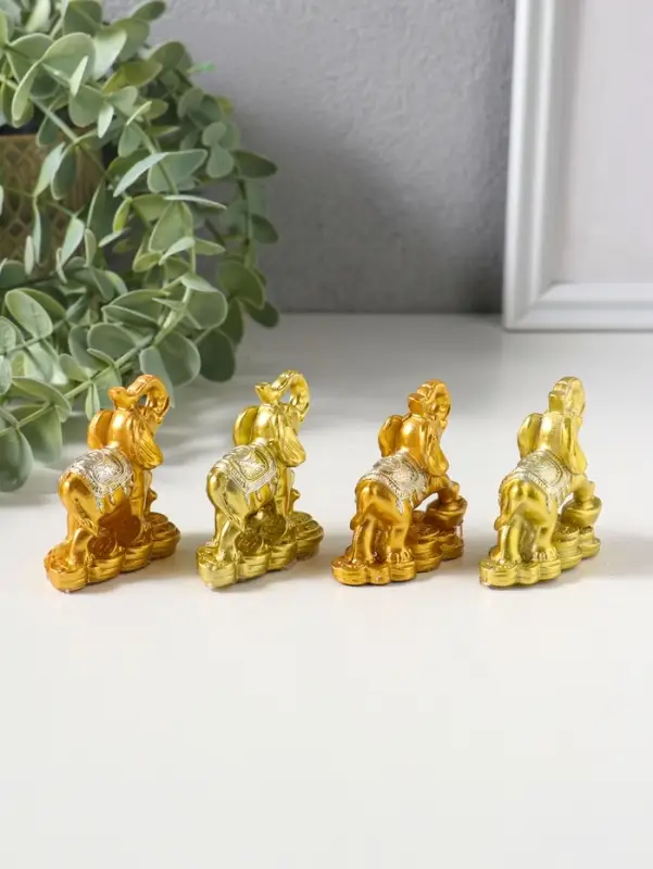 Сувенир полистоун "Слон на монетах и слитках" набор 4 шт золото 2,5х5х5 см