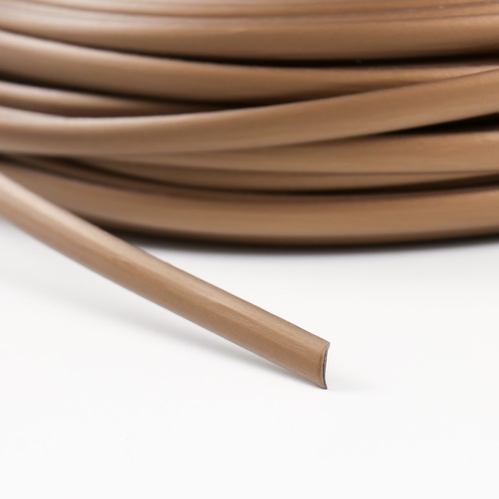 Ротанг искусственный гладкий 8 мм 100 м полумесяц (бронза металик) Ротанг искусственный гладкий 8 мм 100 м полумесяц (бронза металик)