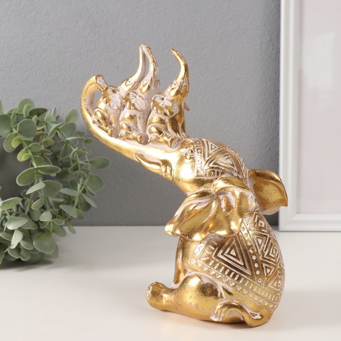 Сувенир полистоун Сувенир полистоун "Слон и 3 слонёнка на хоботе. Индейские узоры" золото 19,8х10,3х21,5 см