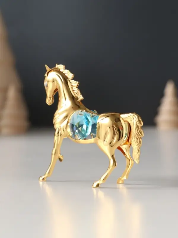 Сувенир Лошадка маленькая с 2-мя голубыми хрусталиками, 7х2х6 см. Сувенир Лошадка маленькая с 2-мя голубыми хрусталиками, 7х2х6 см.
