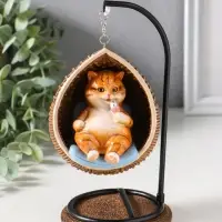 Сувенир полистоун лак "Пухлый кот ест мороженое, в кресле-качеле" 11,5х10,5х18 см