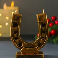 Декоративная свеча "Бронзовая подкова", 85 г, 82х37х95 мм Декоративная свеча "Бронзовая подкова", 85 г, 82х37х95 мм