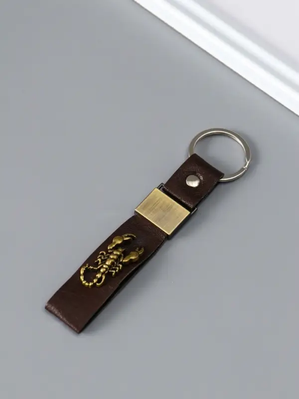 Брелок кожзам  Брелок кожзам "Ремешок со скорпионом" 2,2х10 см