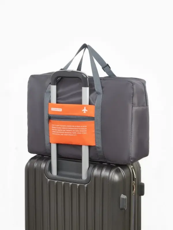 Сумка дорожная на молнии, складная в косметичку, наружный карман, держатель для чемодана, серая, оранжевая