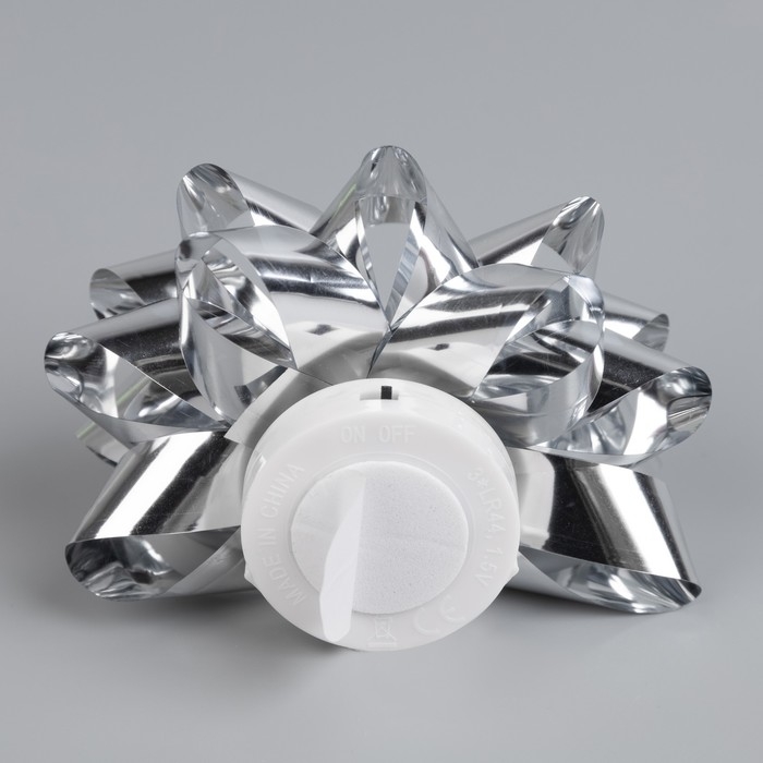 Светодиодная игрушка «Бант-звезда» 9 × 6 × 9 см, батарейки LR44х3 (в комплекте), свечение мульти, серебристая Светодиодная игрушка «Бант-звезда» 9 × 6 × 9 см, батарейки LR44х3 (в комплекте), свечение мульти, серебристая