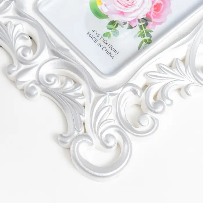 Фоторамка пластик 10х15 см Фоторамка пластик 10х15 см "Королевские пышные листья" серебро 28х20,5 см