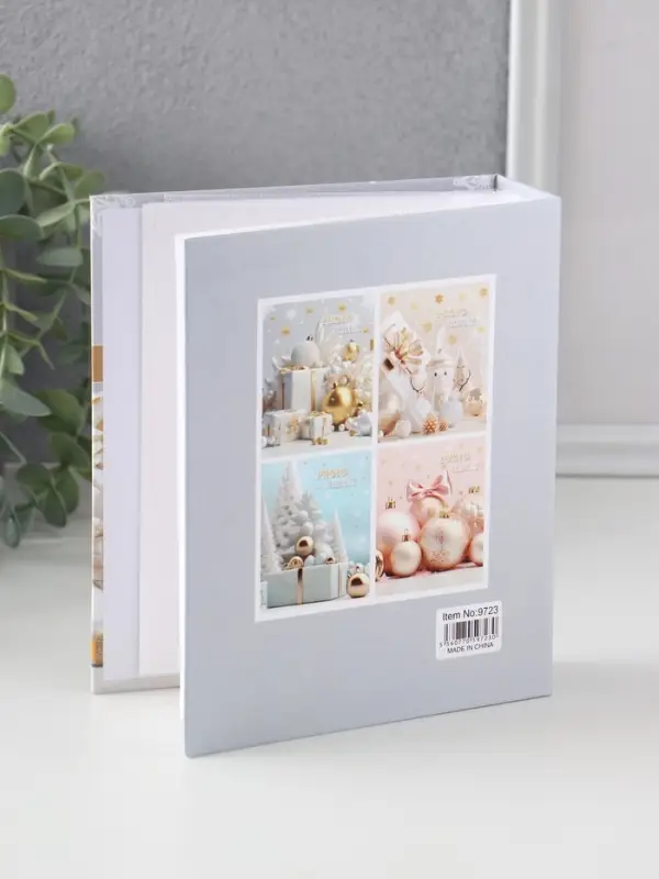 Фотоальбом на 40 фото 10х15 см Фотоальбом на 40 фото 10х15 см "Подарки и ёлочные шары" в коробке тисн.золото 4,7х14х17 см 1087376