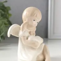 Сувенир керамика "Девочка-ангел в платьице с бантиком, держит сердце" 8,8х7,5х10,3 см