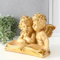 Фигура "Два ангела с книгой" 23х28х19 см, слоновая кость Фигура "Два ангела с книгой" 23х28х19 см, слоновая кость