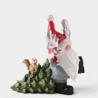 Фигурка новогодняя &laquo;Дед Мороз с рожками на колпаке, несёт елочку с белочкой&raquo;, полистоун, 17&times;10&times;18 см