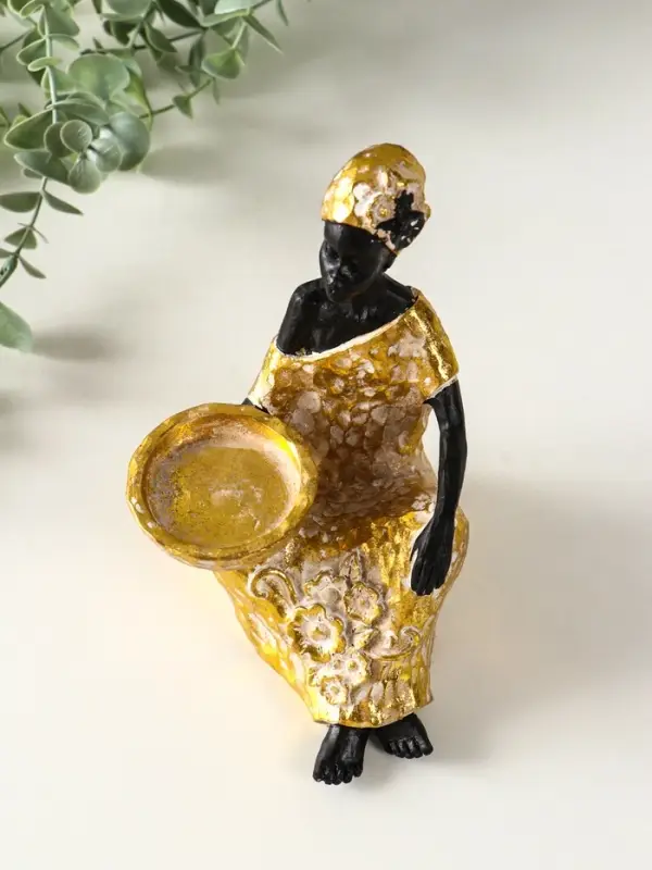 Подсвечник полистоун Подсвечник полистоун "Африканка в золотом платье с цветами" d=4,5 см 10,5х12х16 см
