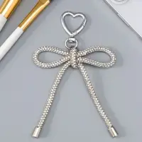 Брелок на карабине "Бант со стразами" серебро 11х7,5х1,5 см