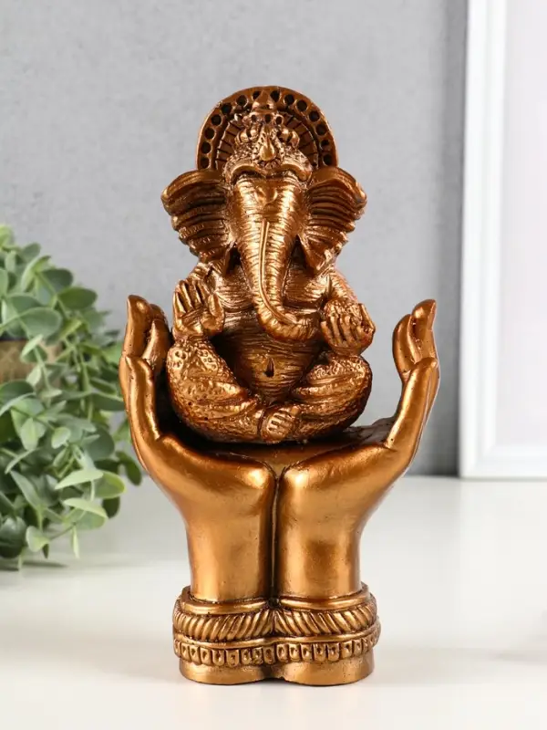 Фигура гипс "Ганеш в руках", высота 21см, бронза