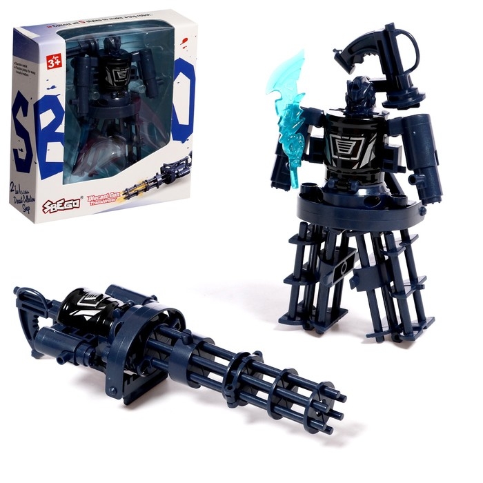 Робот «Миниган», трансформируется, с металлическими элементами Робот «Миниган», трансформируется, с металлическими элементами