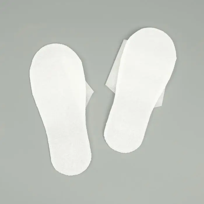 Одноразовые тапочки, эконом, белые, 42 р. Одноразовые тапочки, эконом, белые, 42 р.