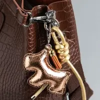 Брелок на карабине кожзам "Терьер" с узлом, золото 14х8х1,2 см