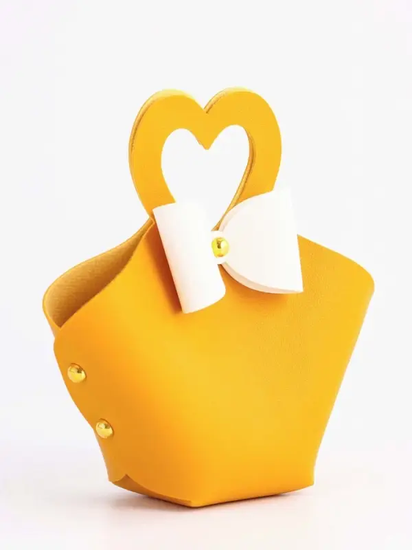 Кожаная подарочная сумочка для бижутерии и сувениров, жёлтая с бантом, 10.5&times;5&times;6 см