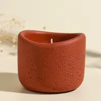 Свеча в вулканическом подсвечнике "Изгиб" персиковая 8,3х8,5х7 см