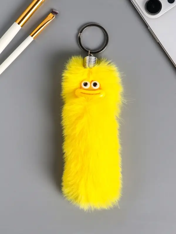 Пушистик на кольце "Чудик" жёлтый 19х4х4 см