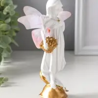 Сувенир полистоун "Девочка-бабочка с золотыми цветами в корзинке" белый 5х6,5х17,2 см