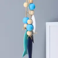 Сувенир интерьерный дерево "Спасательный круг с колоколом и рыбками" 2х10,8х35 см