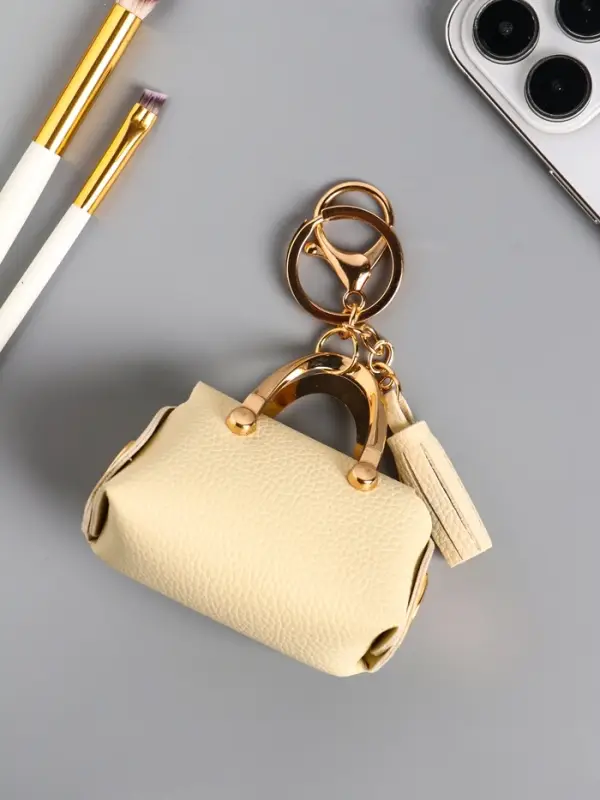 Брелок кожзам с карабином, с кистью Брелок кожзам с карабином, с кистью "Саквояж" сливочный 7,5х4х7 см