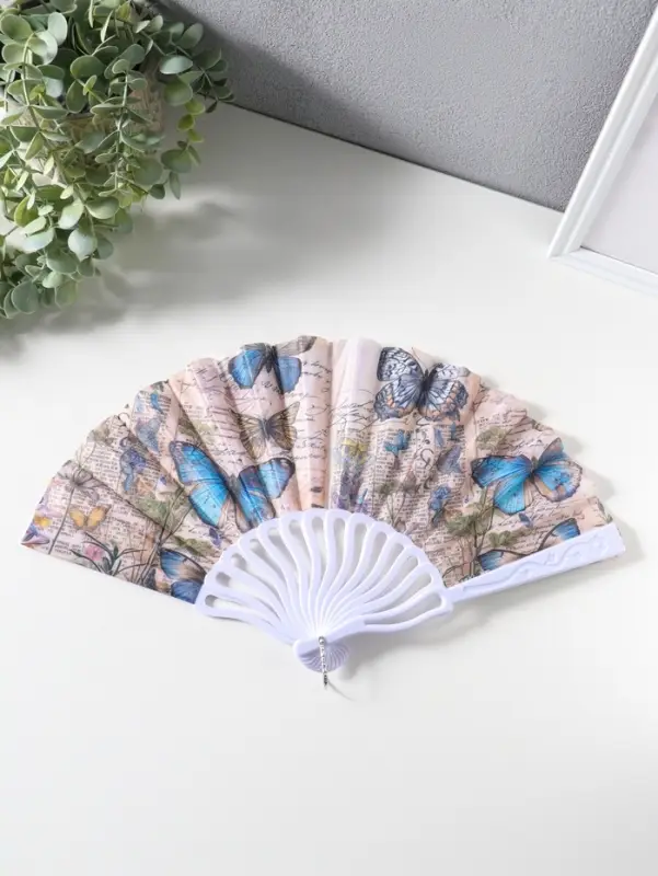 Веер складной &laquo;Синие бабочки и старые газеты&raquo;, 22.5 см