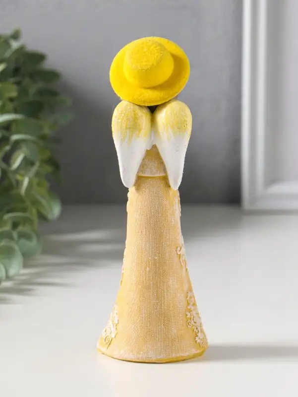 Сувенир полистоун "Малышка-ангел в желтой накидке и шляпке" 6х4,2х17 см