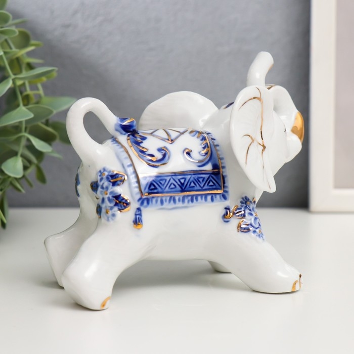 Сувенир керамика Сувенир керамика "Слоны с синей росписью" набор 7 шт h= 11 см 31,5х23,5 см