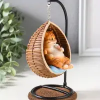 Сувенир полистоун лак "Пухлый кот ест мороженое, в кресле-качеле" 11,5х10,5х18 см