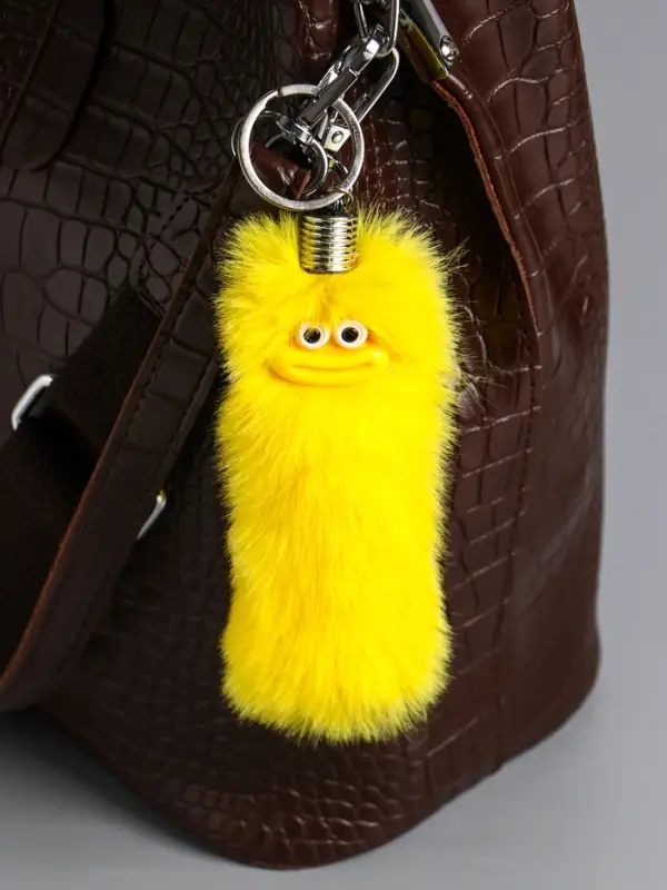 Пушистик на кольце "Чудик" жёлтый 19х4х4 см