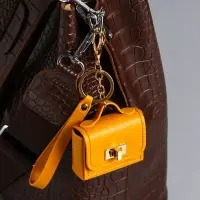 Брелок кожзам с карабином, с ремешком "Сумочка" жёлтый 6,2х2,5х7 см Брелок кожзам с карабином, с ремешком "Сумочка" жёлтый 6,2х2,5х7 см