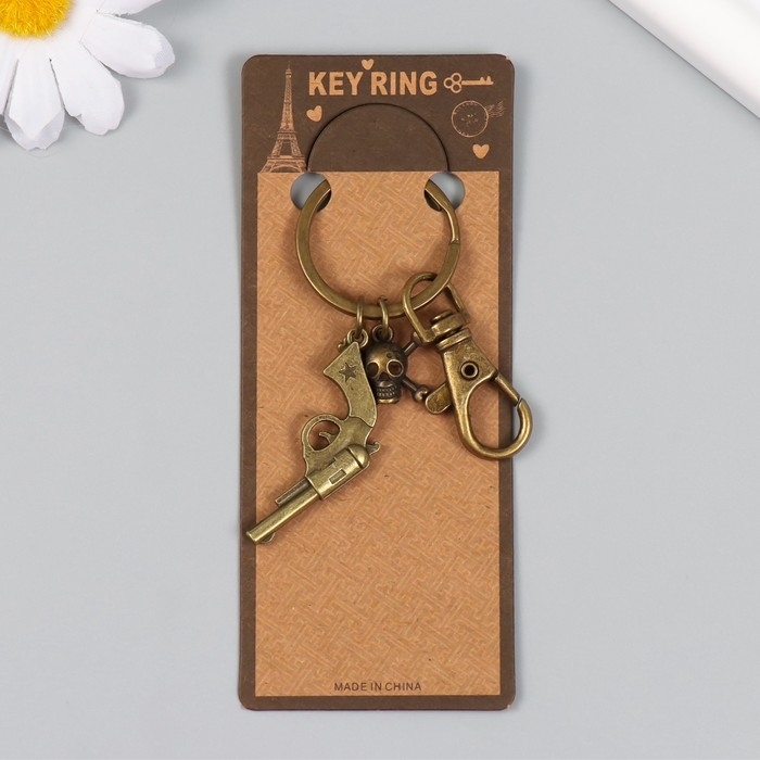 Брелок металл с карабином  Брелок металл с карабином "Револьвер и череп" бронза 7,5 см