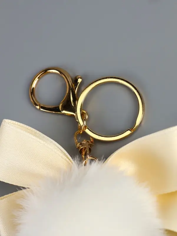 Пушистик на кольце "Бант с подвеской" белый 12х5х5 см