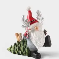 Фигурка новогодняя &laquo;Дед Мороз с рожками на колпаке, несёт елочку с белочкой&raquo;, полистоун, 17&times;10&times;18 см