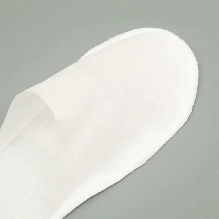 Тапочки одноразовые Эконом белые, закрытый мыс Тапочки одноразовые Эконом белые, закрытый мыс