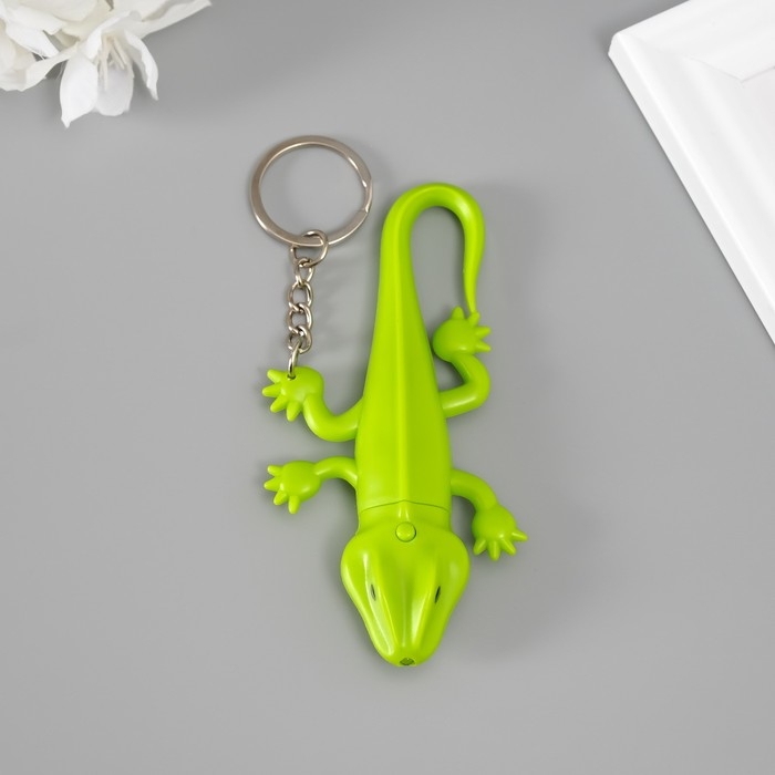 Фонарик кричалка на кольце Фонарик кричалка на кольце "Ящерка"