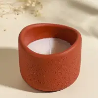 Свеча в вулканическом подсвечнике "Изгиб" персиковая 8,3х8,5х7 см